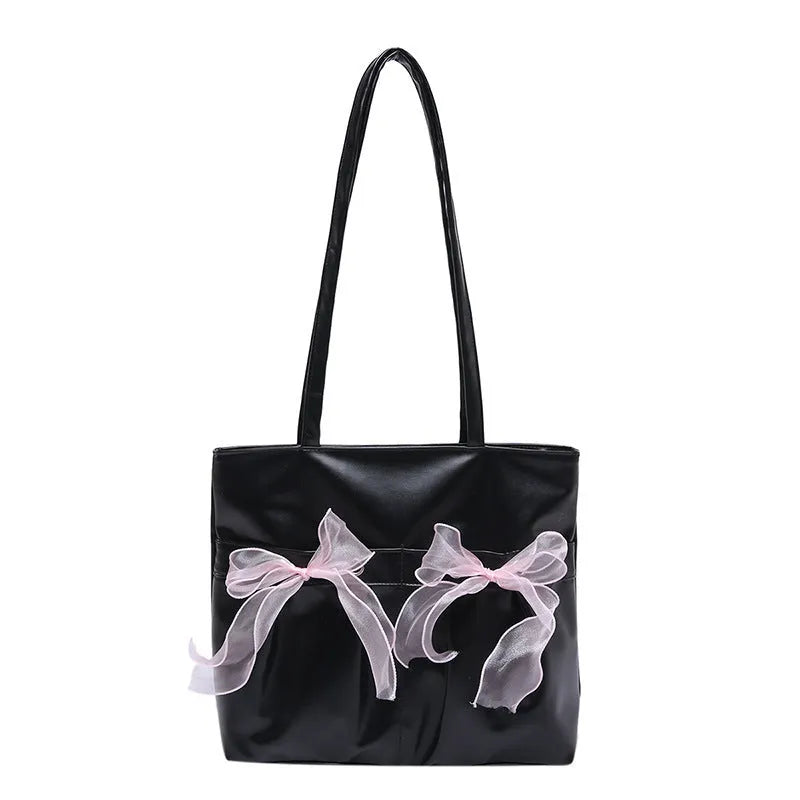 College style bow tote bag in black with double shoulder straps and decorative bow