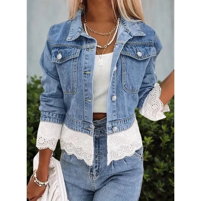 Blue women's denim jacket with white lace stitching on the front, long sleeves.