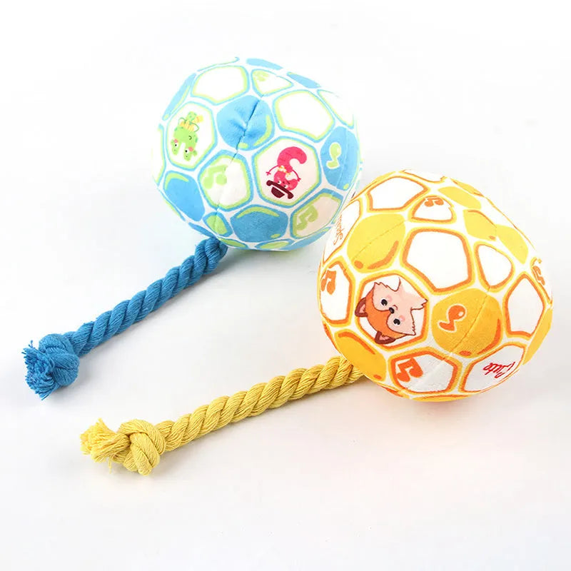 Blue and yellow elastic football dog toy with attached cotton rope for tug-of-war