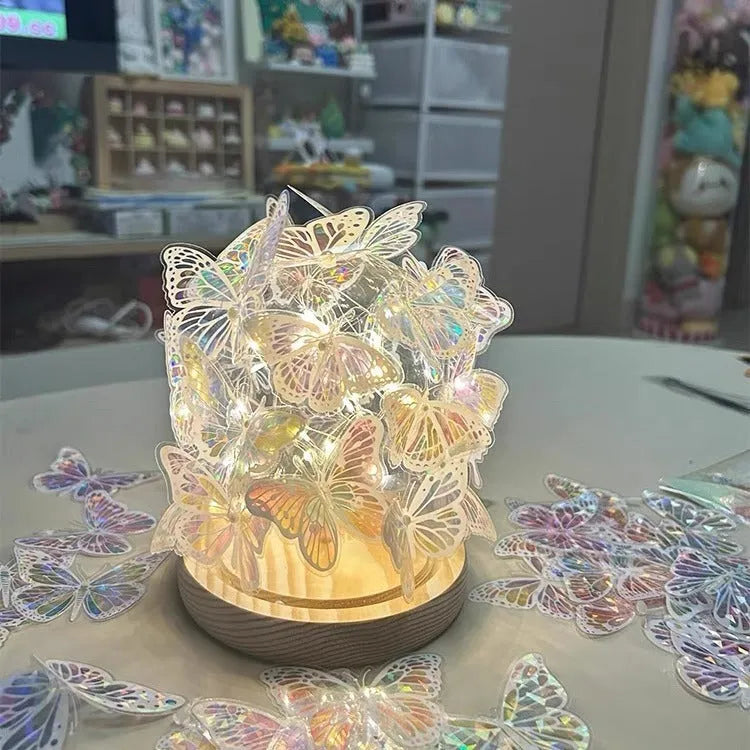 Butterfly night lamp with glass shade on raw wood base for bedroom ambience lighting