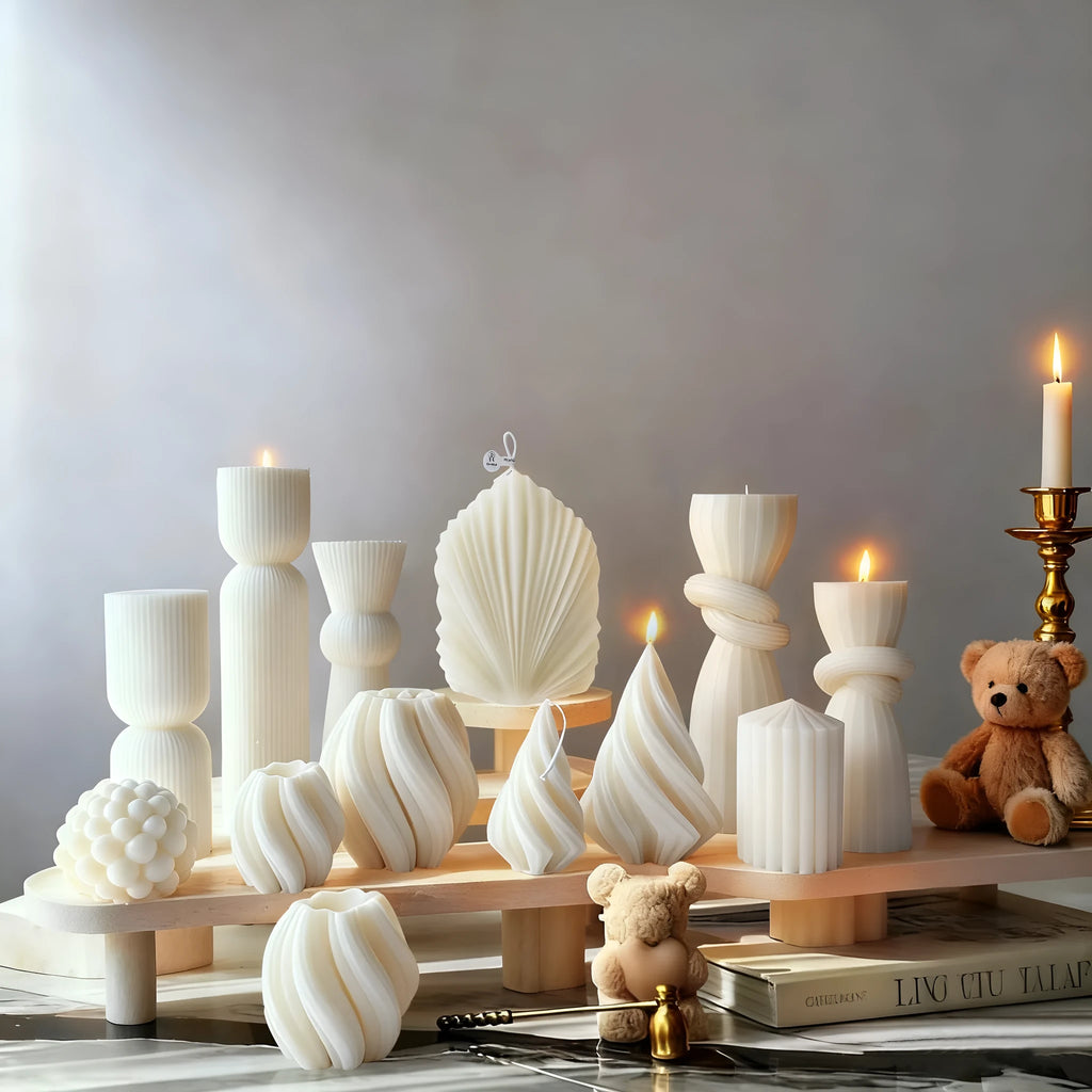 White cylindrical soy wax aromatherapy candle with geometric spherical shape on a table