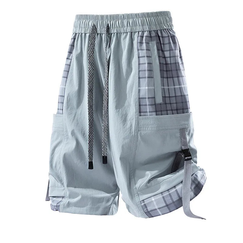Men's black loose-fit cargo shorts with plaid stitching on the legs