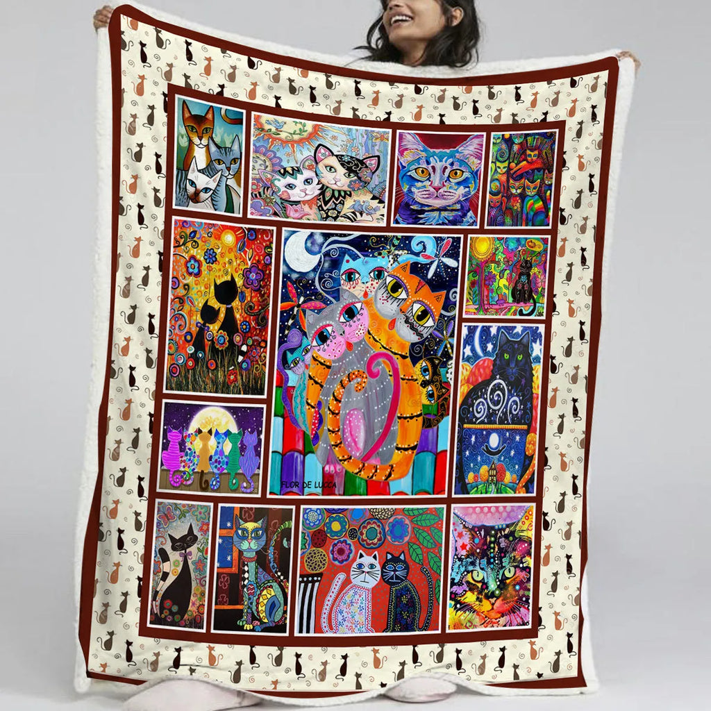 Multicoloured cat themed Sherpa fleece blanket 130x150cm with hemmed edges on a sofa