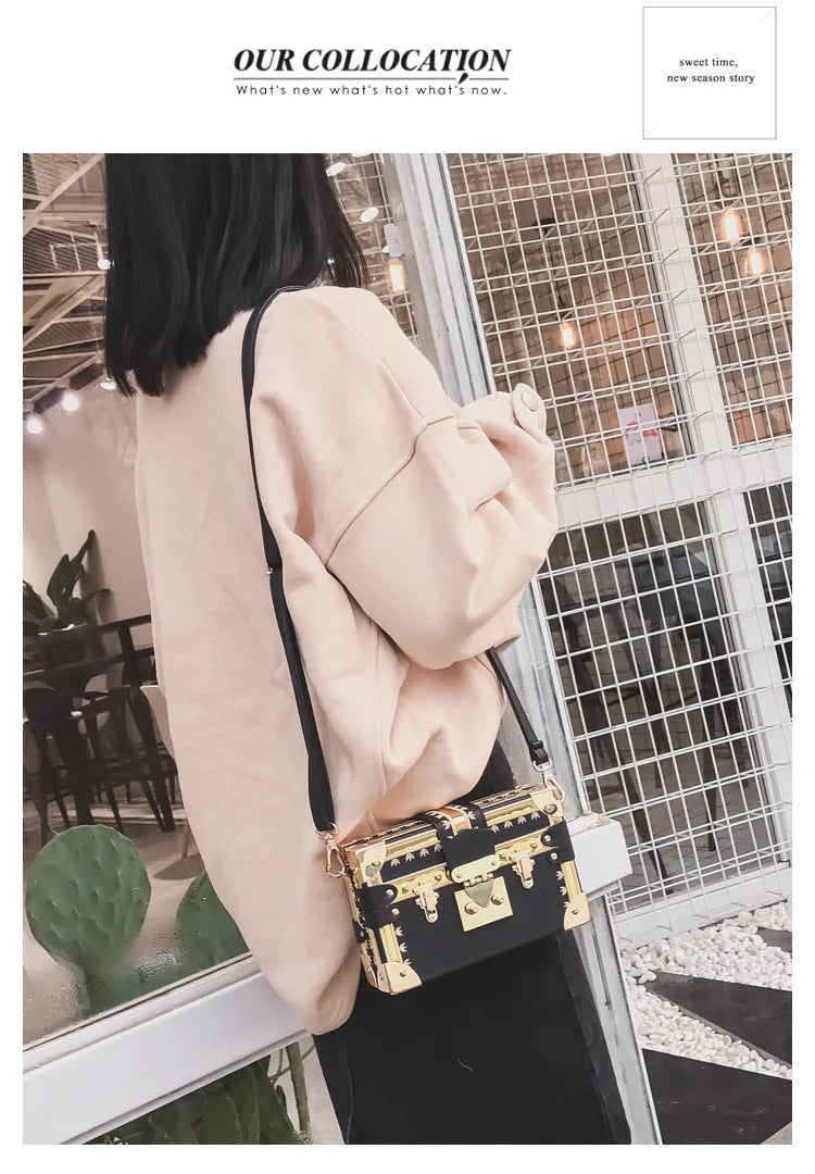 Hard structured women's shoulder bag in PU leather with single strap and flap design