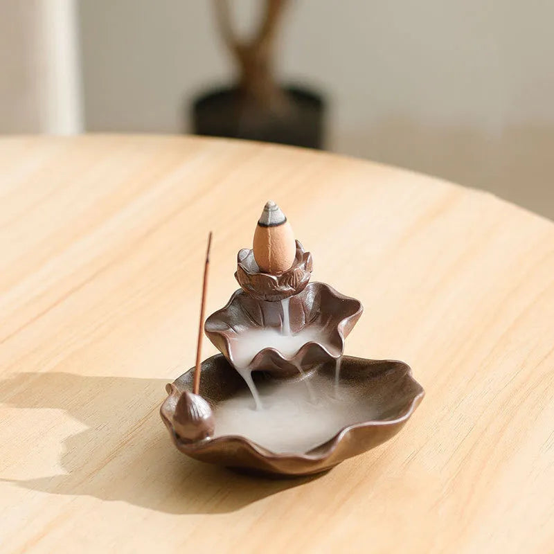 Ceramic reverse flow incense burner with good luck patterns and lotus design in square form