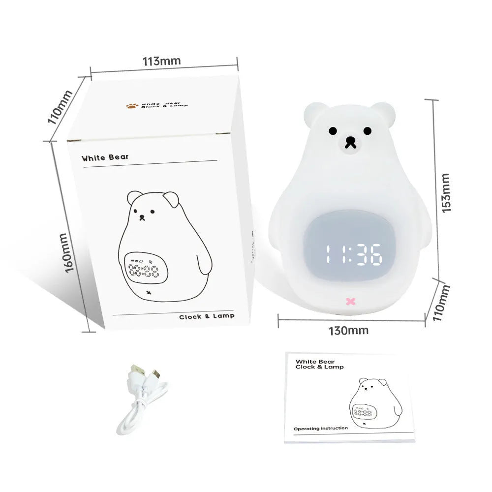 White silicone cartoon bear night light with remote control on a surface.