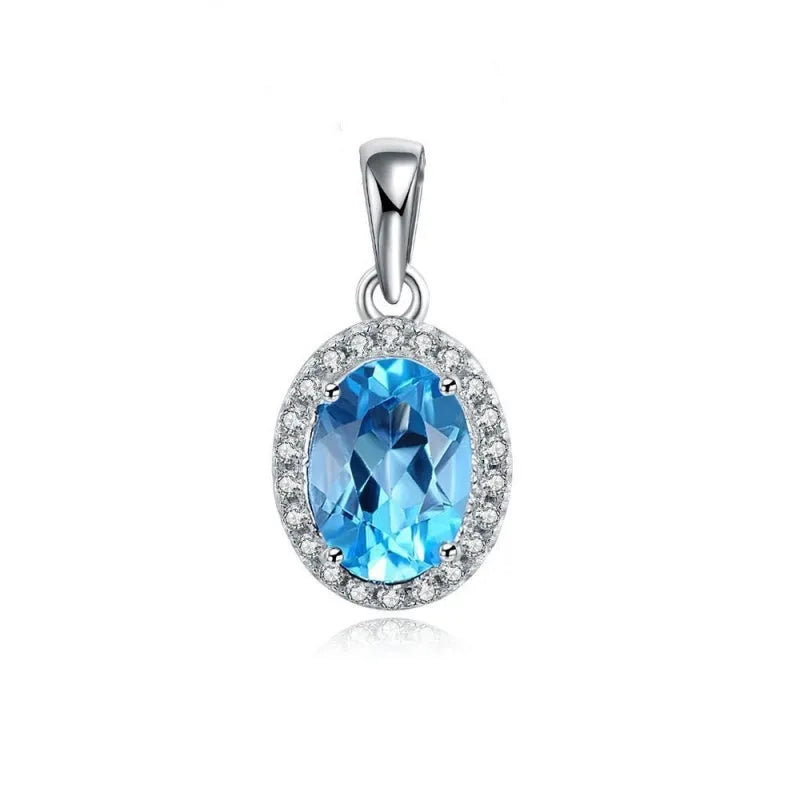 Geometric 925 sterling silver jewellery set with blue topaz stones, showing earrings, ring, pendant and necklace.