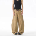 Brown men's loose-fit straight-leg jeans with a button fly and mid-rise waist.