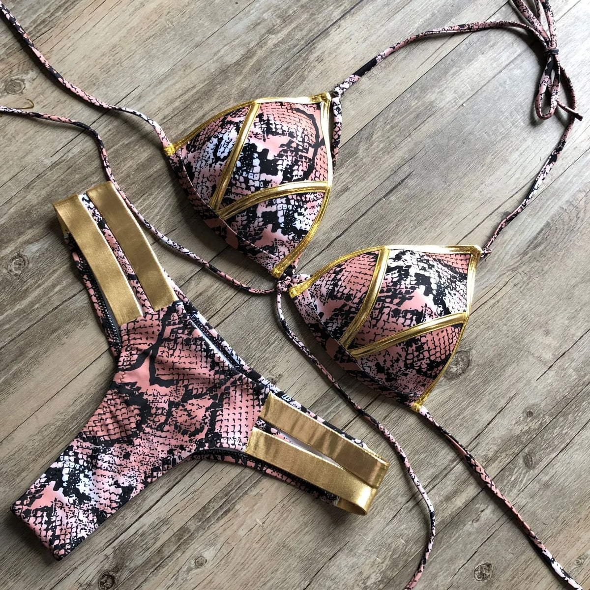 Women's bronzing bikini swimsuit in nylon with cotton lining and chest pads.