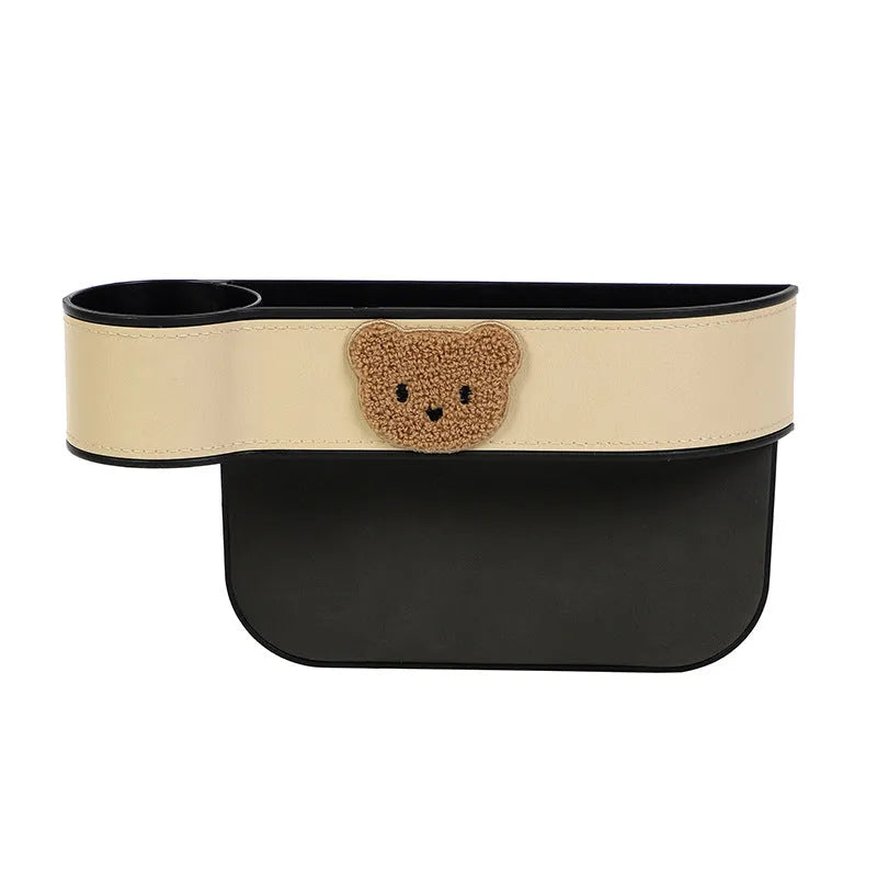 Leather car seat gap storage box with cartoon bear design for centre console organisation.