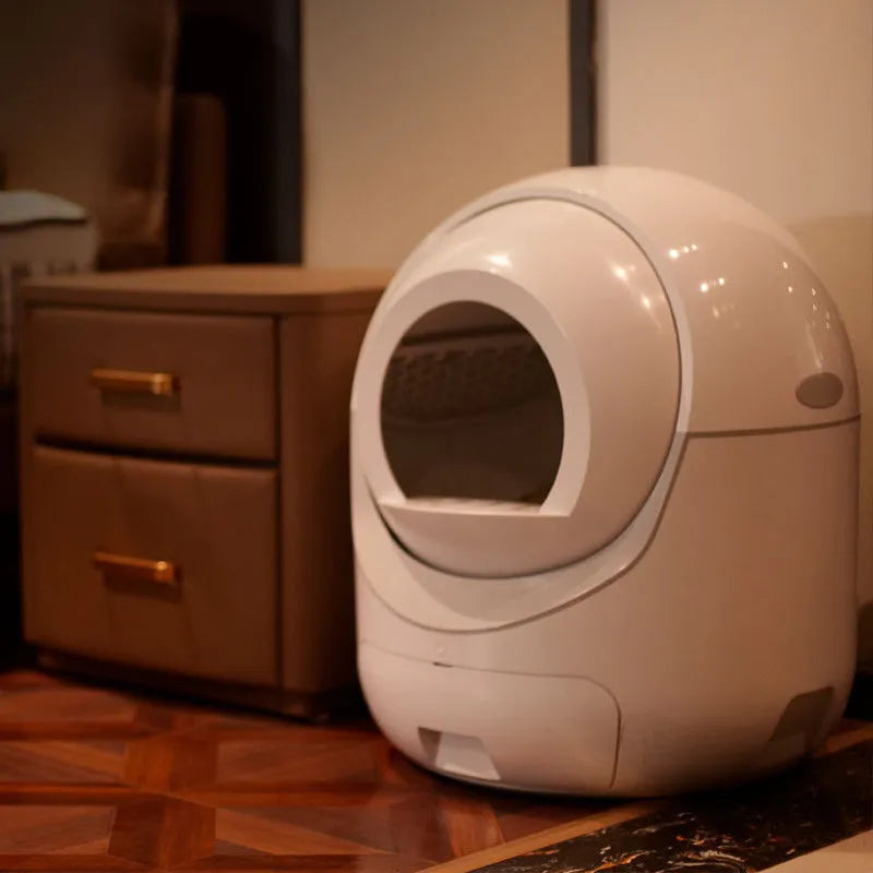 White fully automatic cat litter box with fully enclosed design, door curtain, and 220V US outlet option