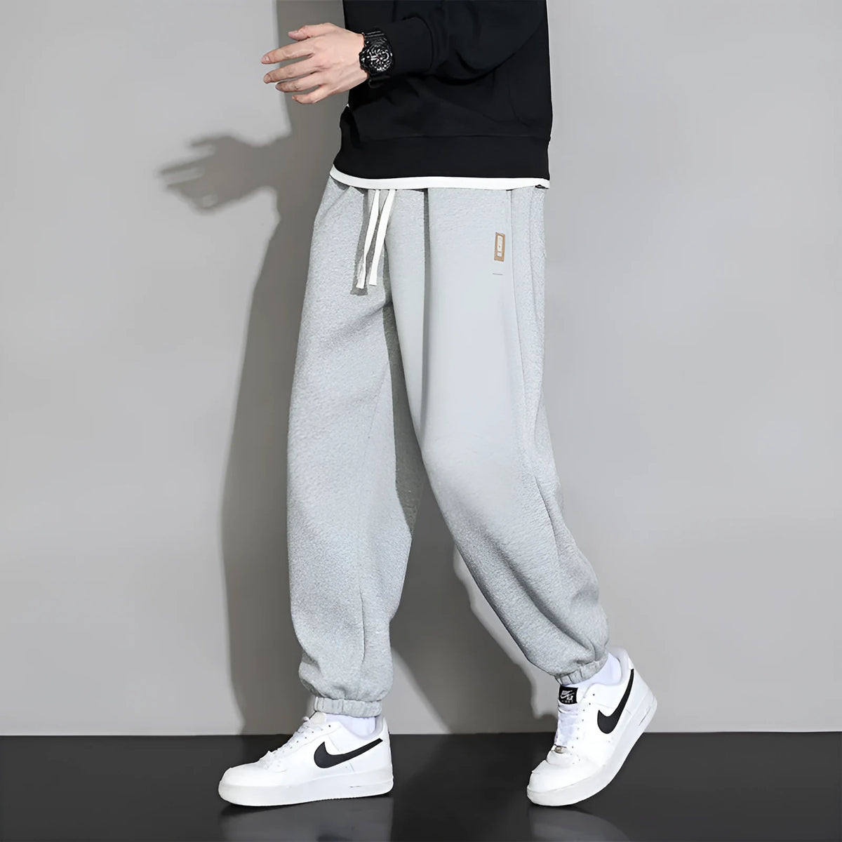 Men's loose casual sports trousers in grey, black, or army green, sizes M-8XL, cotton polyester, mid waist drawstring.