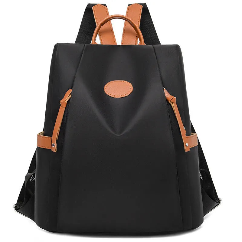 Waterproof Oxford cloth anti-theft travel backpack in black with sandwich pocket and zipper compartments