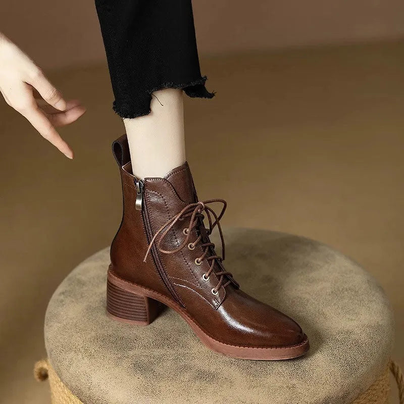 Women's black pointed-toe ankle boots with 5.5cm heel and 13cm shaft on artificial PU upper