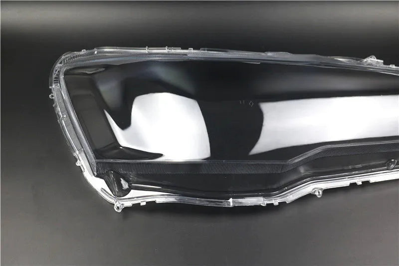 Transparent plastic headlight housing cover showing 50x30x20mm dimensions