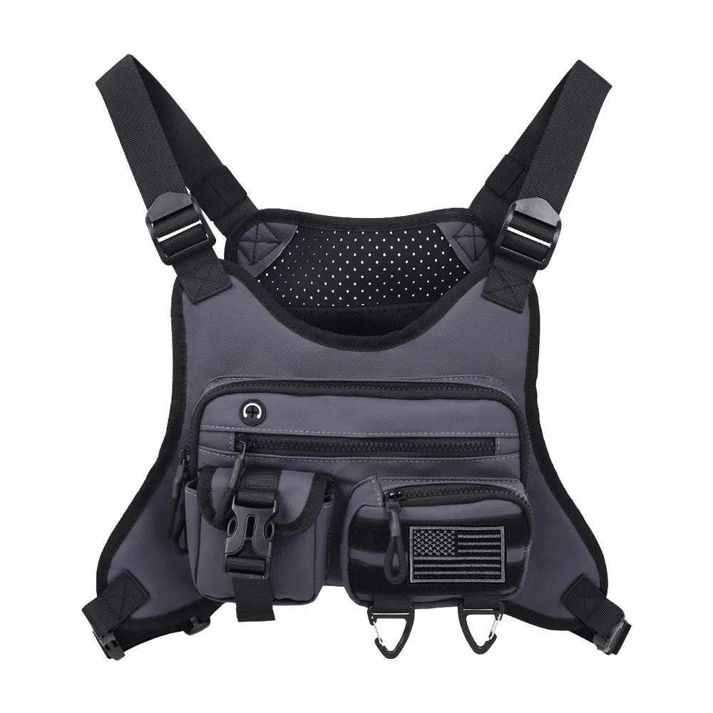 A man wearing a black Oxford cloth chest bag vest with adjustable straps, suitable for riding and outdoor sports.