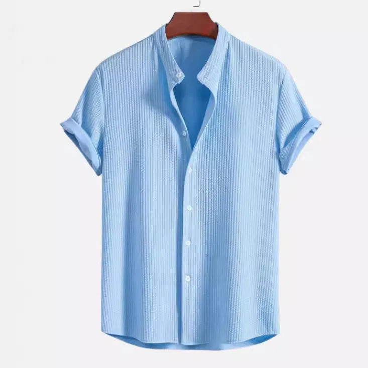 Men's loose-fitting short sleeve casual shirt in light blue polyester fabric.