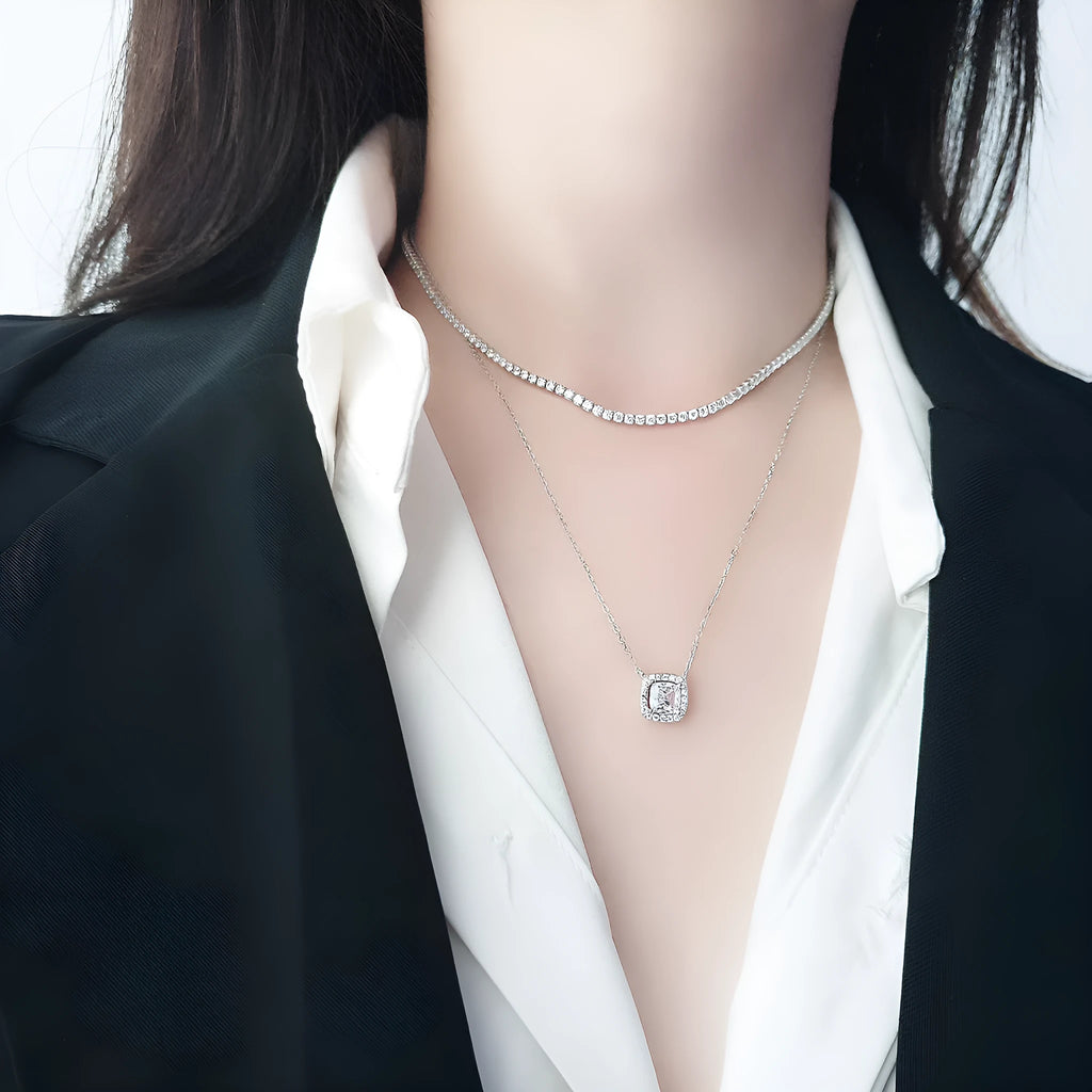 Women's sterling silver necklace with diamond-cut round pendant