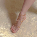 Gold alloy retro tassel anklet with geometric shape on woman ankle