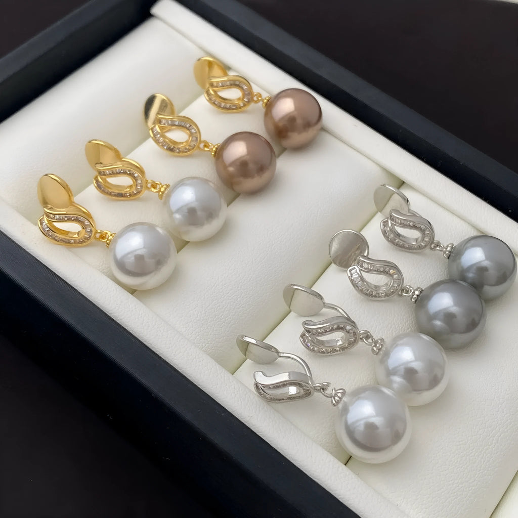 Geometric champagne pearl earrings with inlaid zircon on copper base in ear clip style
