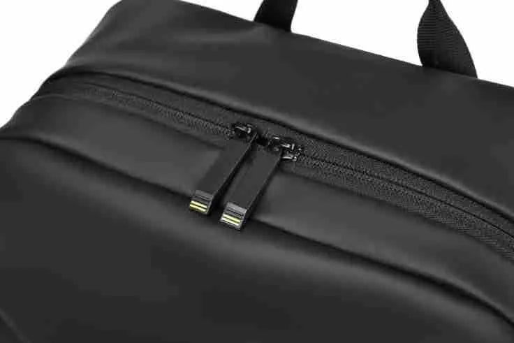 Simple black PU leather backpack with visible sewing thread detailing and large storage capacity