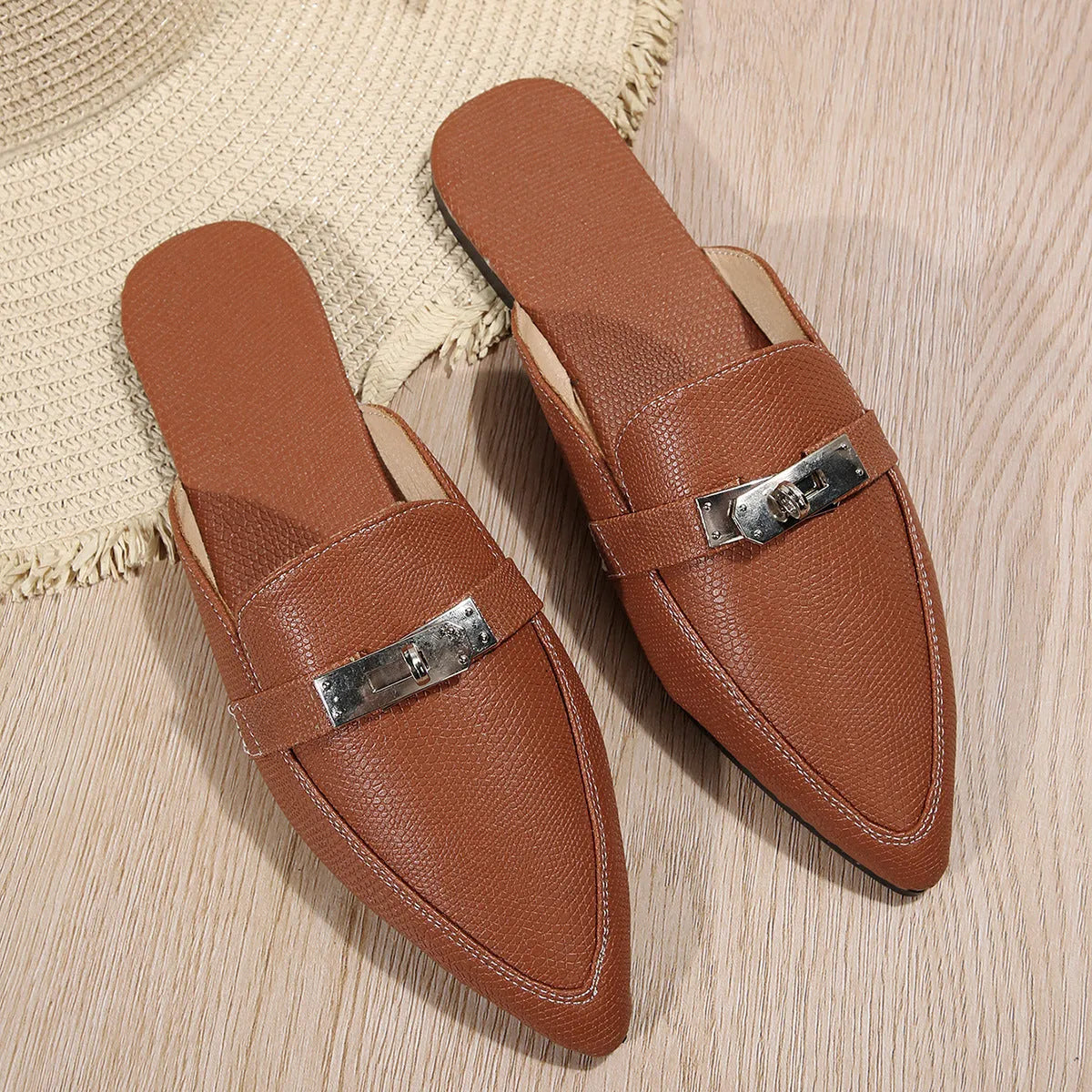 Light brown women's pointed-toe semi-slippers with a low heel, PU upper, and rubber sole.