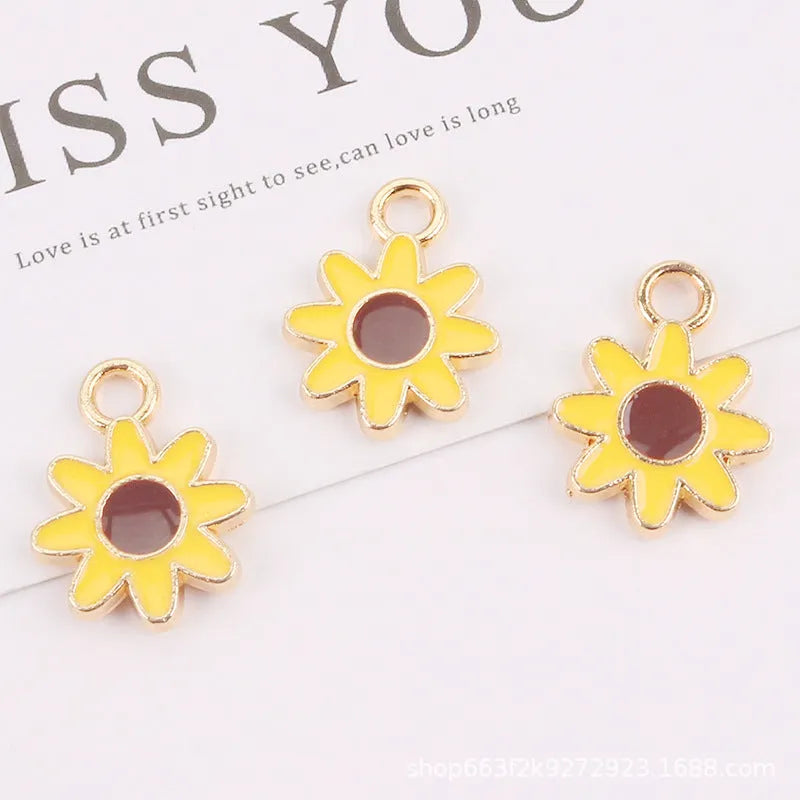 Cute flower keychain accessory in alloy with dripping oil finish, available in P777-1 P777-2 P777-3 colours