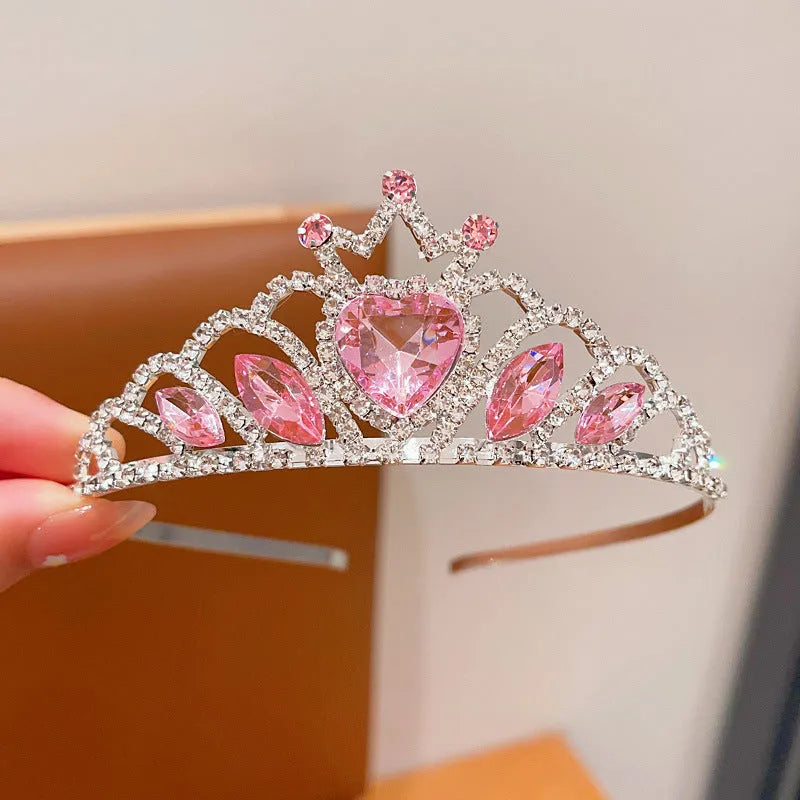 Children's metal princess crown headband with crystal stones in pink, light blue, or light purple.