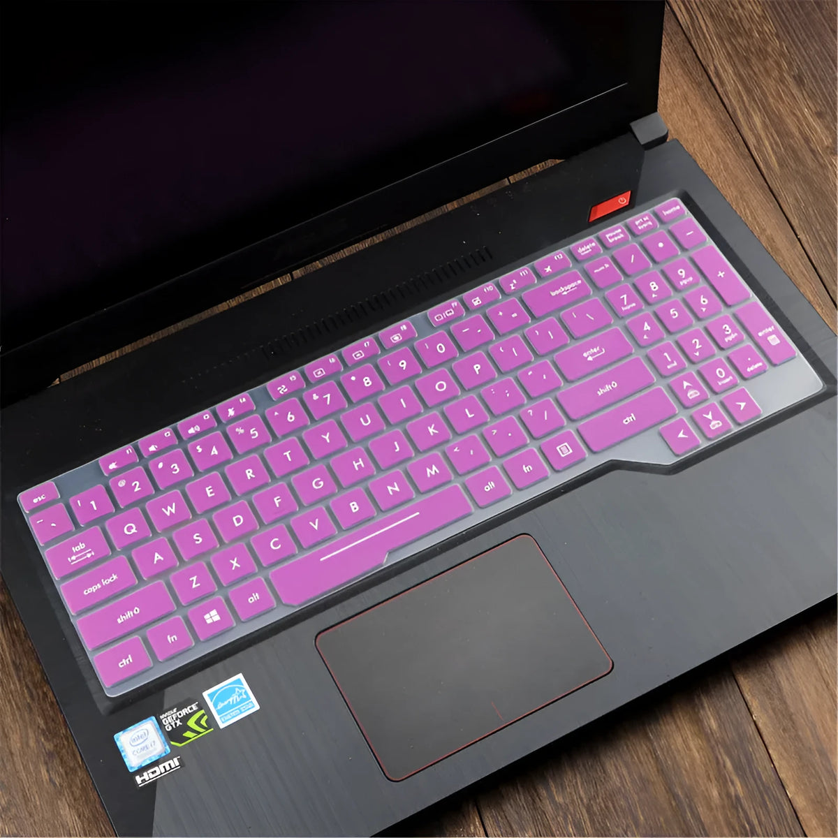 ASUS Flight laptop keyboard protective film cover in multiple colour options showing translucent and gradient designs