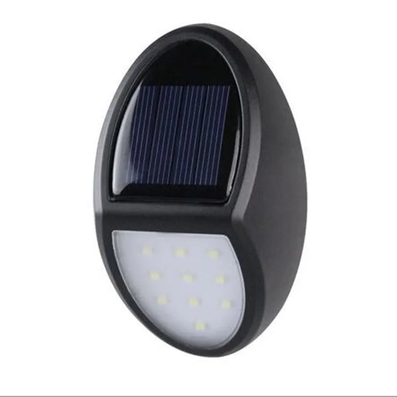 Black LED solar wall light with solar panel and automatic dusk-to-dawn sensor