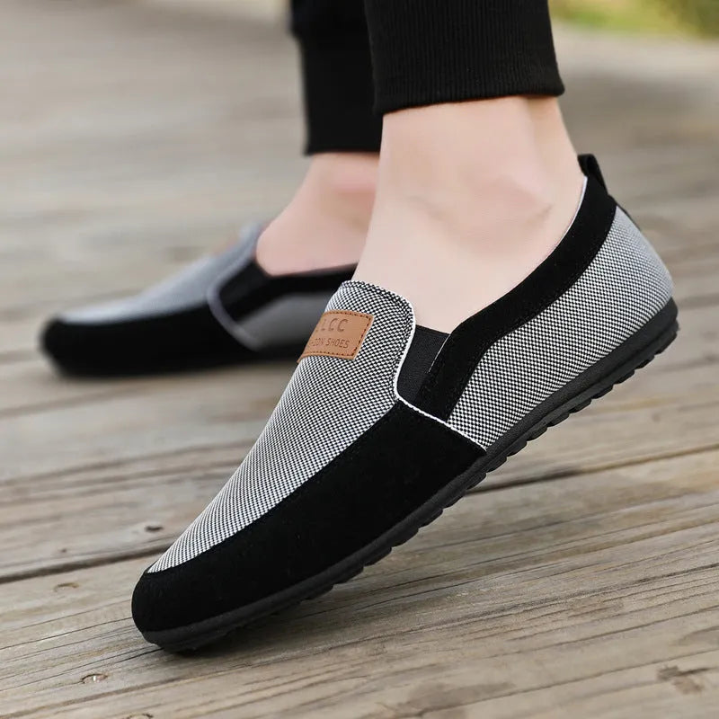 Men's grey canvas board shoes with round toe and rubber sole