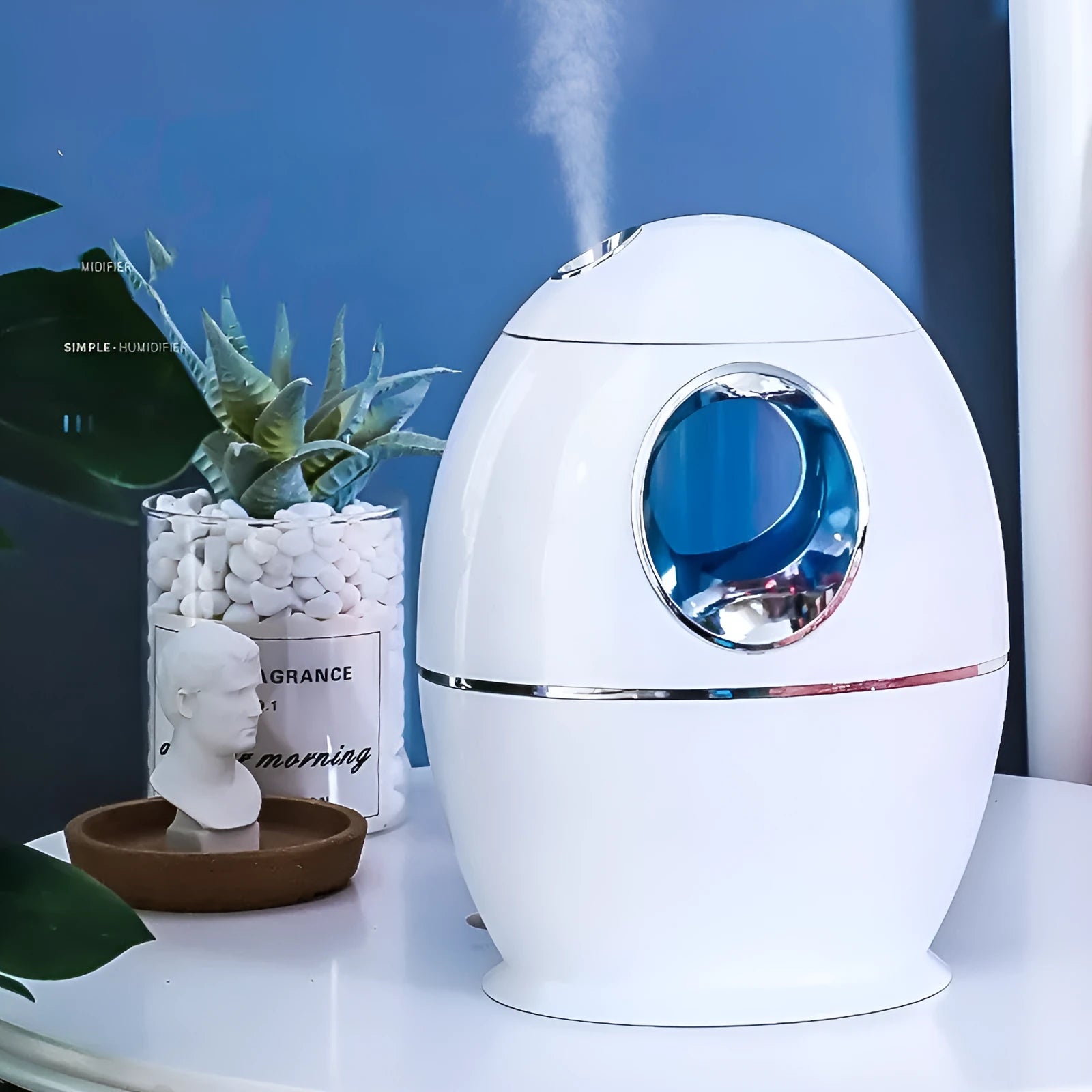 White columnar household air disinfection humidifier with USB cable on a table.