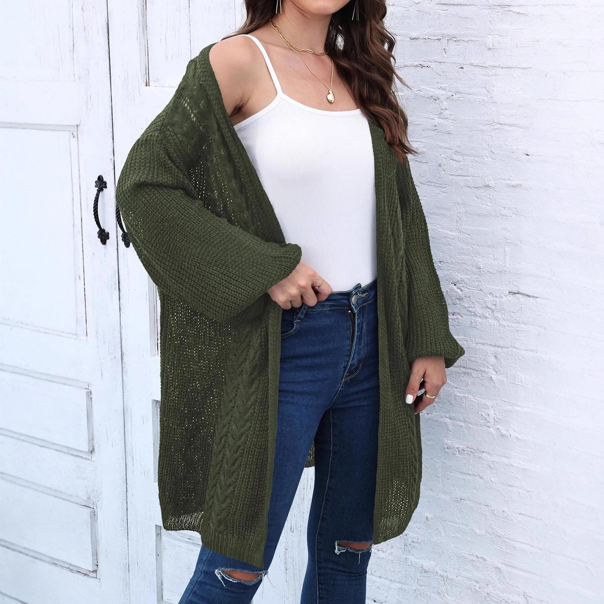Women's loose casual acrylic cardigan in army green, shown front-on