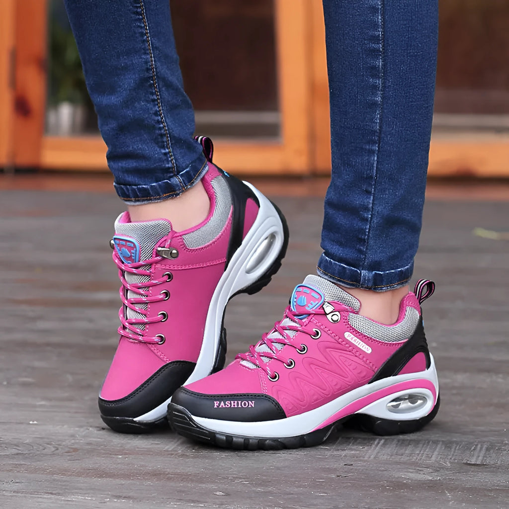 Low-top hiking and walking shoes in black with synthetic leather upper, mesh lining, and non-slip PU outsole.