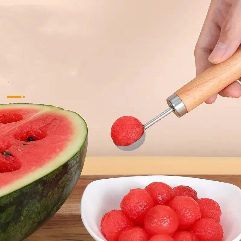 Stainless steel watermelon cutting tool set with three wooden handle gadgets for cutting squares, scooping balls, and carving