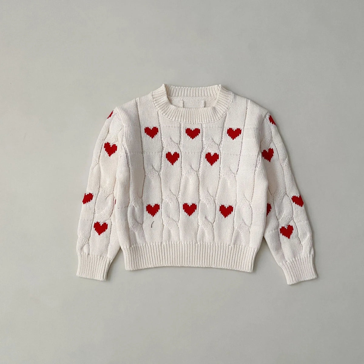 Cotton round neck pullover for baby in red colour with long sleeves on white background