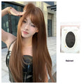 Warm brown long straight synthetic wig with fringe on a model
