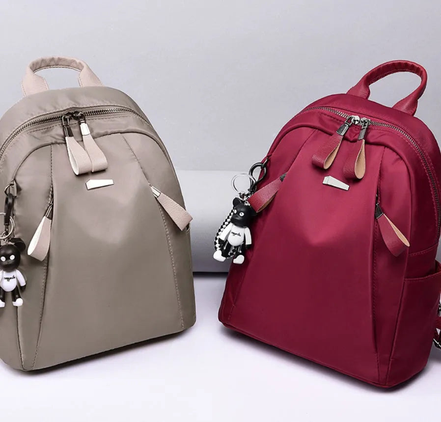 Medium square rucksack in Oxford cloth with double straps and internal organisation pockets