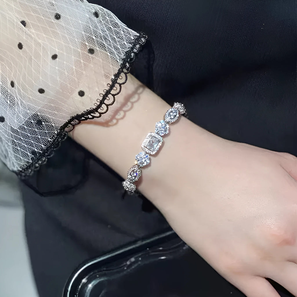Women's geometric S925 silver-plated bracelet with inlaid zircon stones, shown in two size options.