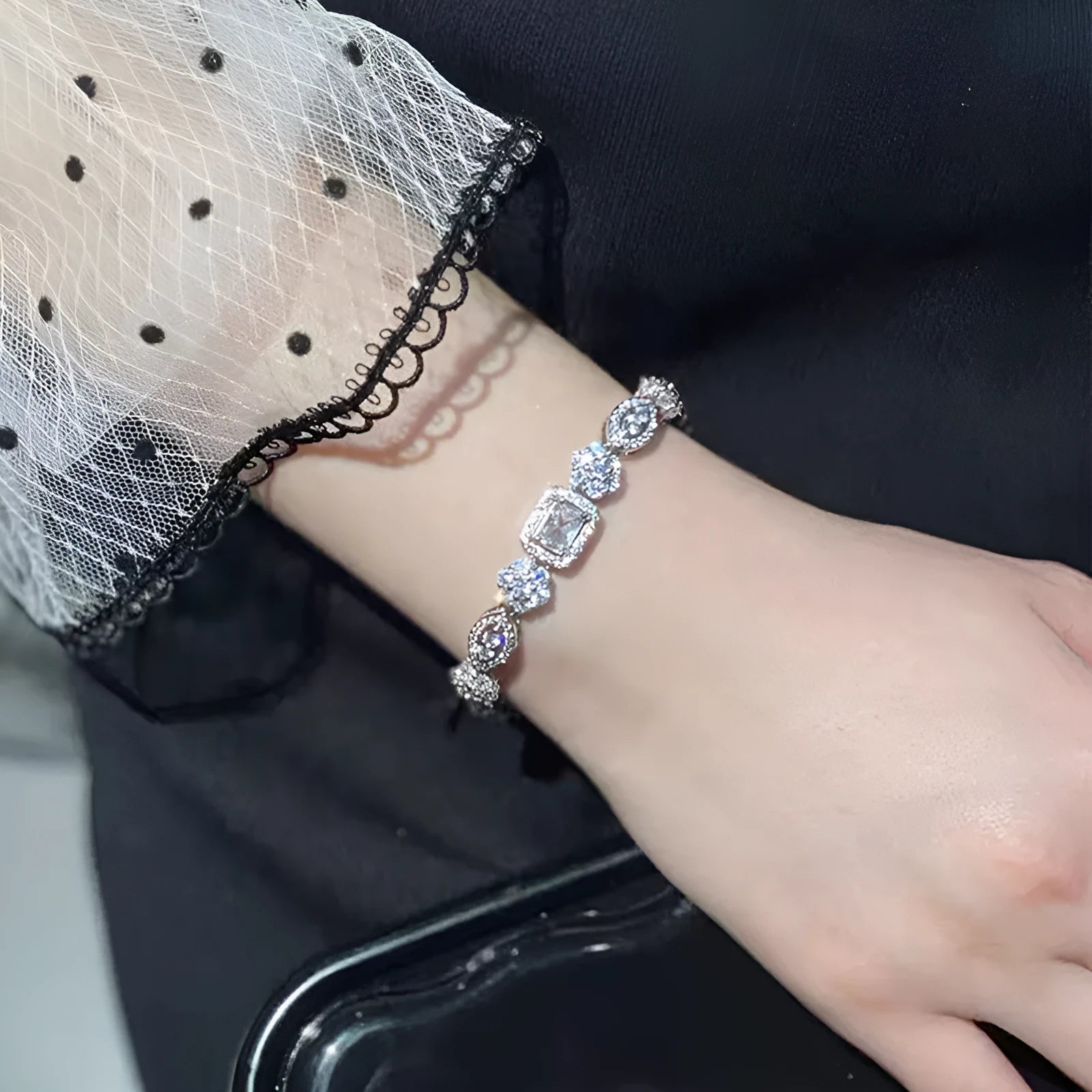 Women's geometric S925 silver-plated bracelet with inlaid zircon stones, shown in two size options.