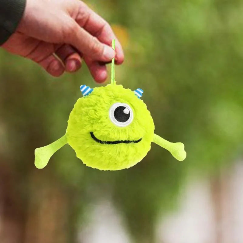 Green interactive sound dog teething ball with plush and TPR construction, 12cm diameter