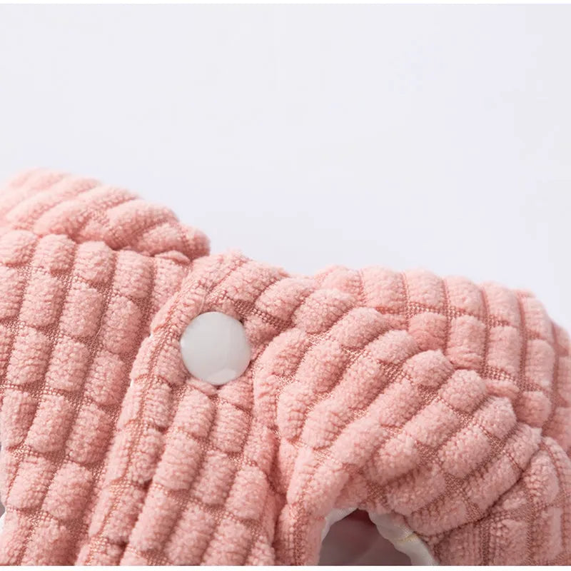 Pink corduroy dog vest with metal leash ring, cotton lining, and bear emblem tag, for small and medium dogs