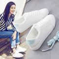 Women's white canvas sneakers with rubber sole and polyester lining, sizes 35-40, casual trainers
