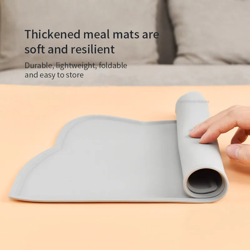 Blue silicone pet feeding mat with cat head design measuring 44cm by 24cm