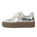 Retro round toe casual board shoes with cross straps in milky white colour
