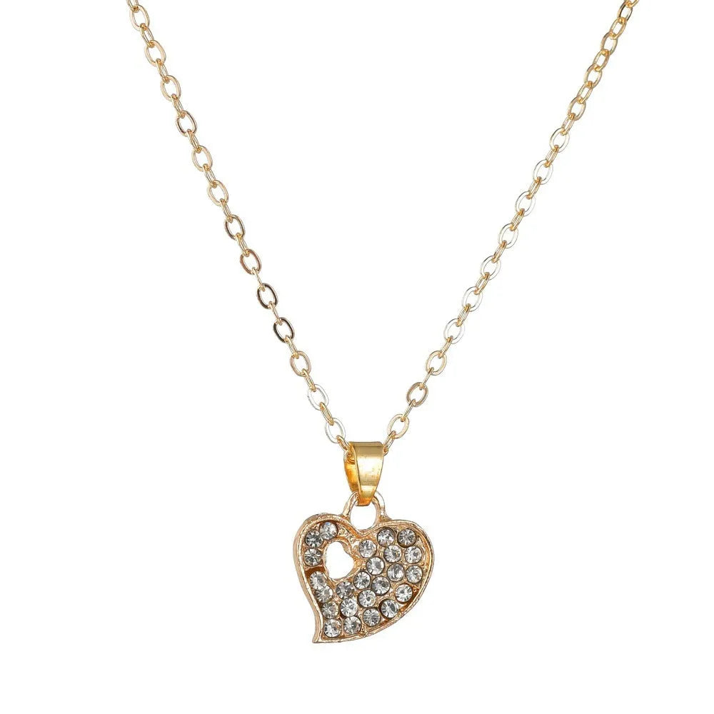 Gold electroplated alloy jewellery set with earrings, pendant, and bracelet featuring love, water drop, or bell patterns