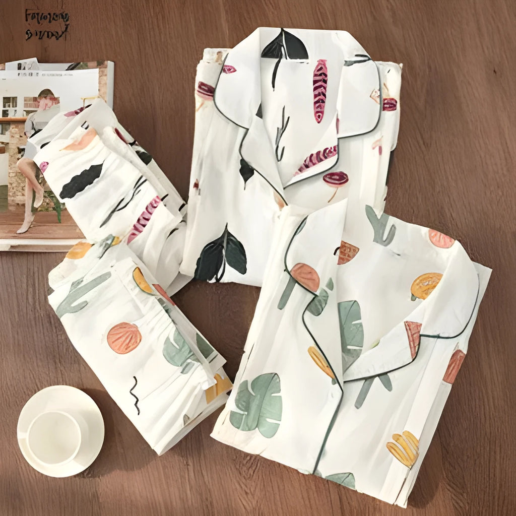 Traditional polyester maternity pajama set with turn-down collar, full bell sleeves, and ankle-length trousers in solid natural colour
