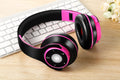 A foldable wireless Bluetooth over-ear headset in blue, showing adjustable hinges and ear cups.