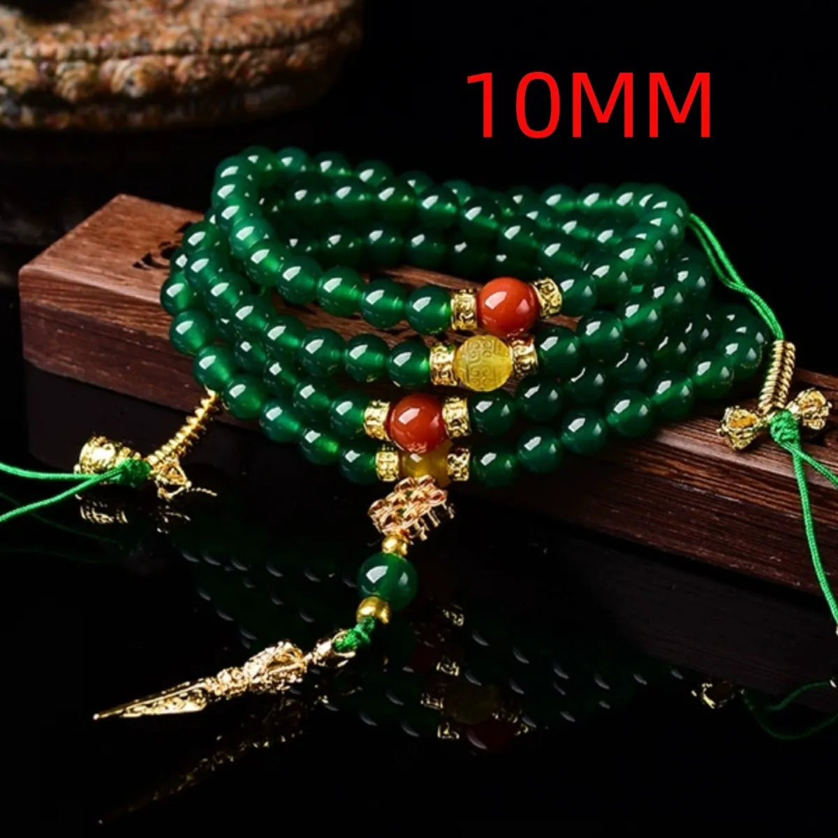 Multi-strand green agate bracelet for men and women on wrist, showing natural stone beads.