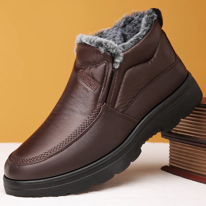 Men's black fleece-lined winter slip-on shoe with a non-slip rubber sole, shown on a size 45 foot.